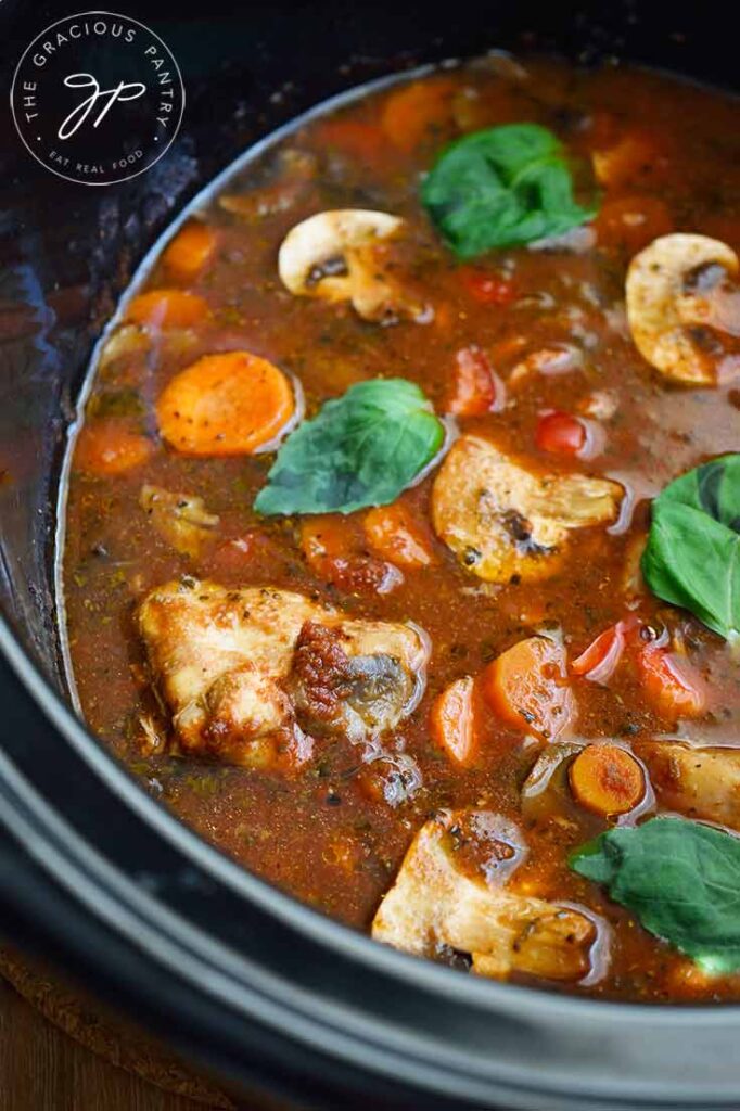 An up close view of Slow Cooker Chicken Cacciatore still on the crock.