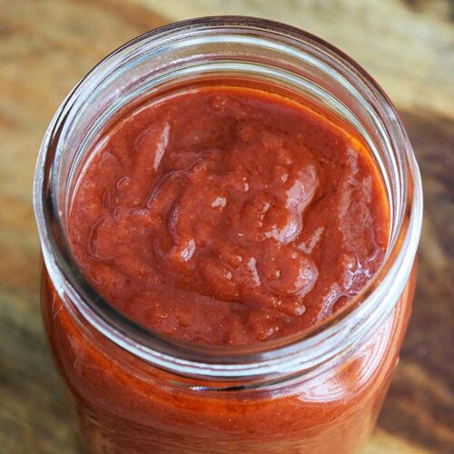 Maple BBQ Sauce in a quart size canning jar.