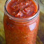 Restaurant Salsa in a canning jar with the lid off.