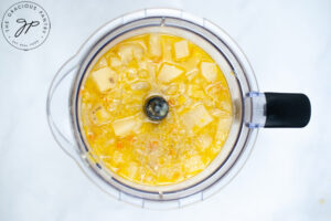 The soup in a blender, waiting to be blended to a smooth consistency.