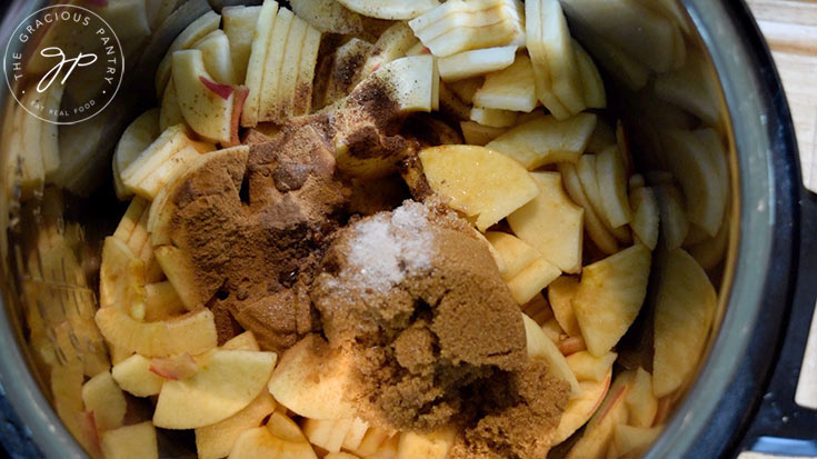 All the Amish Apple Butter Recipe ingredients in a pot.