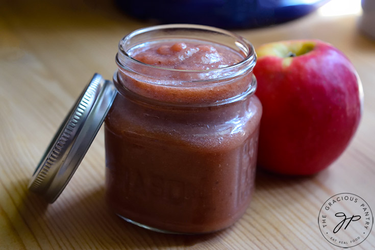The finished Strawberry Apple Sauce in a canning jar.