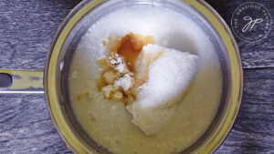 All the ingredients for this Coconut Caramel Recipe in a pot, ready to cook.