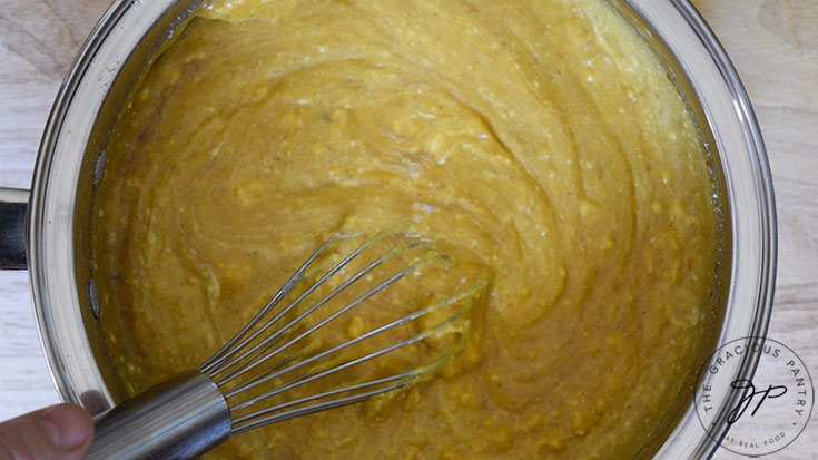 The mixed Curried Pumpkin Soup Recipe ingredients in a pot.