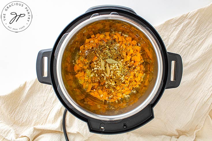 The spices added to vegetables in an Instant Pot.