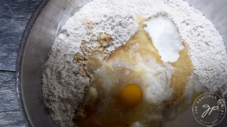 The wet ingredients added to the mixing bowl.