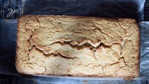 The loaf cooling on a wire rack.