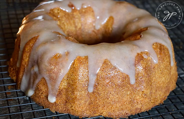 The finished Spiced Apple Bundt Cake Recipe with caramel drizzled over the top.