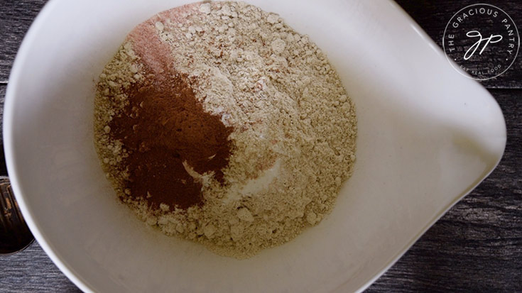 The dry ingredients in a white mixing bowl.