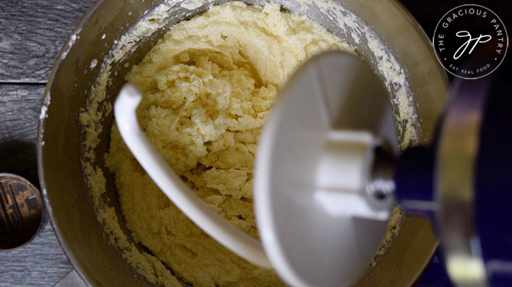 The whipped wet ingredients in the electric mixer bowl.