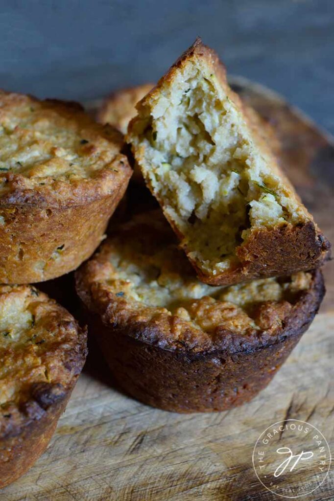 Zucchini muffins on a cutting board.