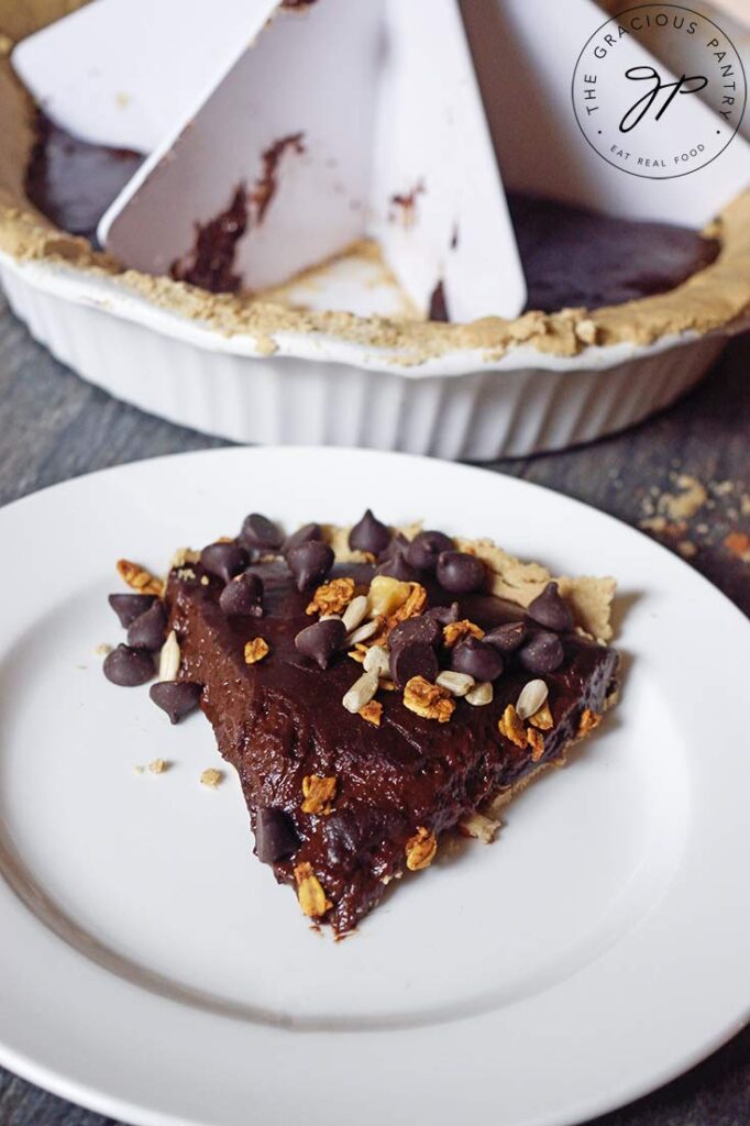 An overhead shot of a single slice of this Easy Homemade Chocolate Pie on a white plate.