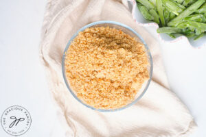 A bread crumb mixture in a glass bowl.