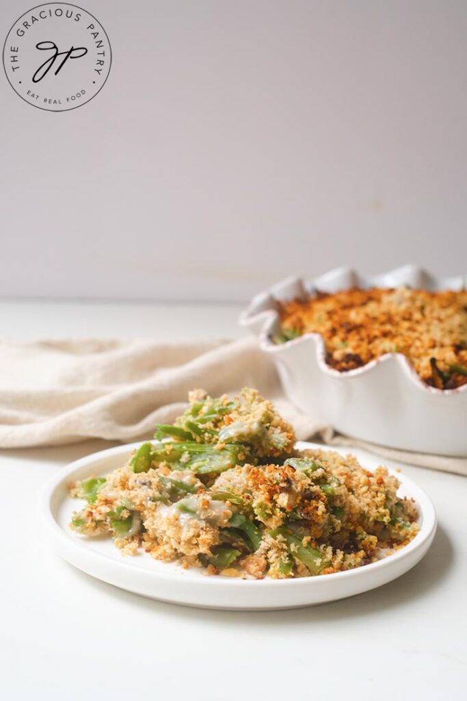 A serving of this Healthy Green Bean Casserole on a white plate.