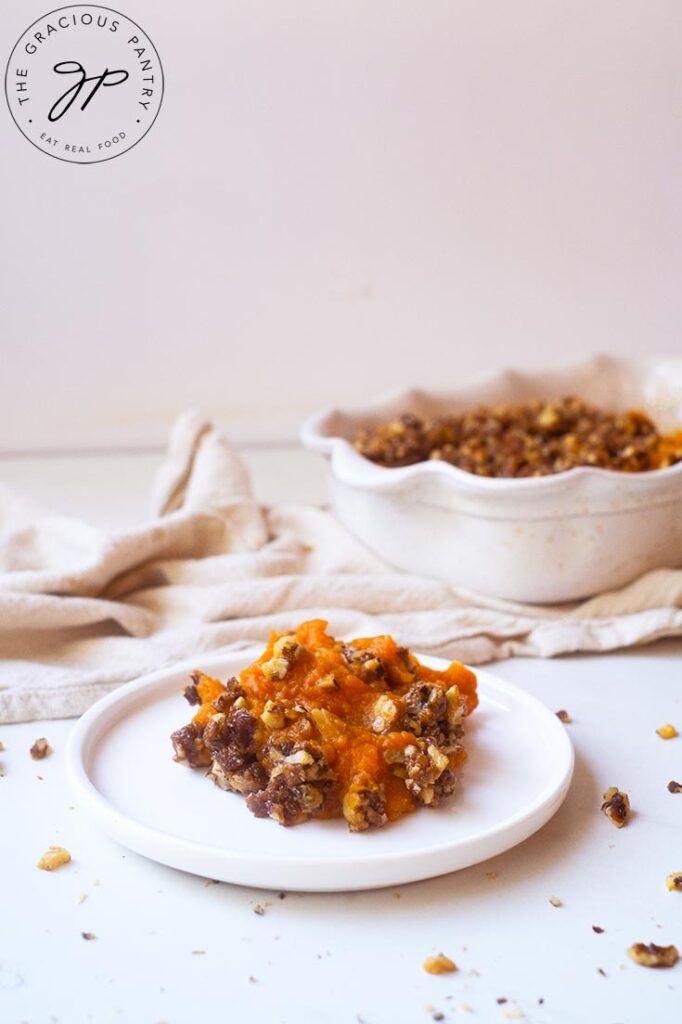 A single serving of Healthy Sweet Potato Casserole Recipe on a white plate.