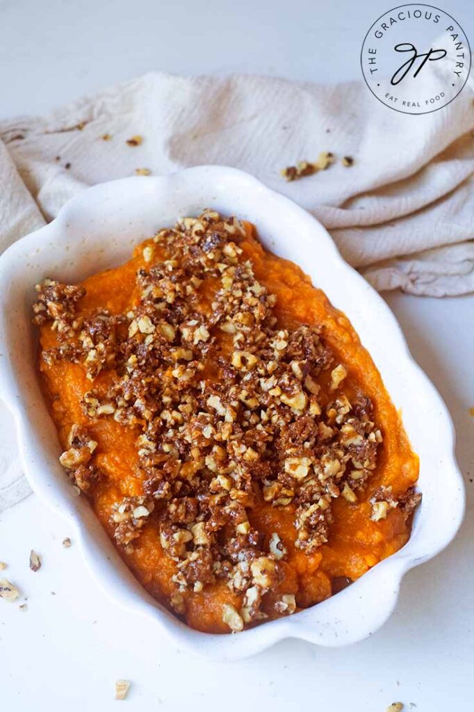 The finished Healthy Sweet Potato Casserole in a white casserole dish.