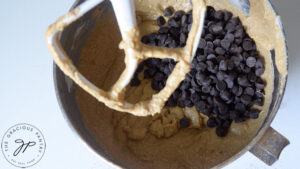 A cup of chocolate chips have been added to the Snickerdoodle Pumpkin Bread batter.