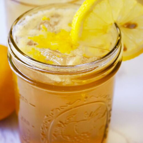 An up close shot of one of two glasses filled with Lemon Drop Mocktail.