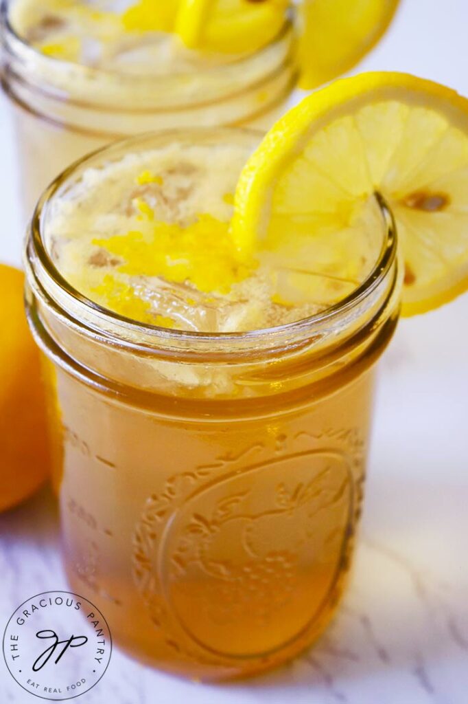 An up close shot of one of two glasses filled with Lemon Drop Mocktail.