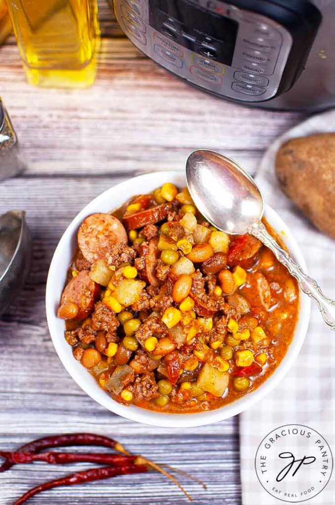 And overhead view looking down into a white bowl filled with this Instant Pot Texas Cowboy Stew Recipe.