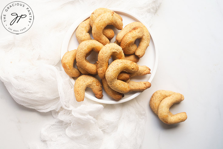 The finished Almond Horns on a white place, on a white background.