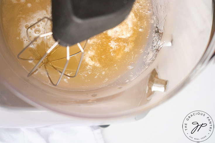 All the Healthy Marshmallows Recipe ingredients in the bowl of an electric mixer.