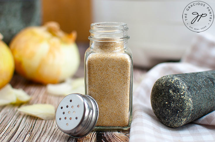 The finished onion powder in a spice jar.