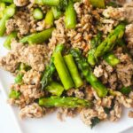 An up close, overhead view of a white platter holding a serving of this Ground Turkey Dinner Skillet Recipe.