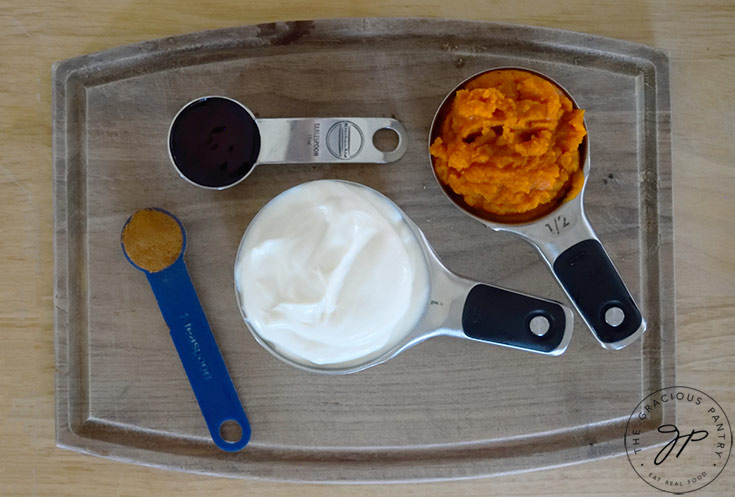 Pumpkin Pie Smoothie Recipe ingredients collected in measuring cups