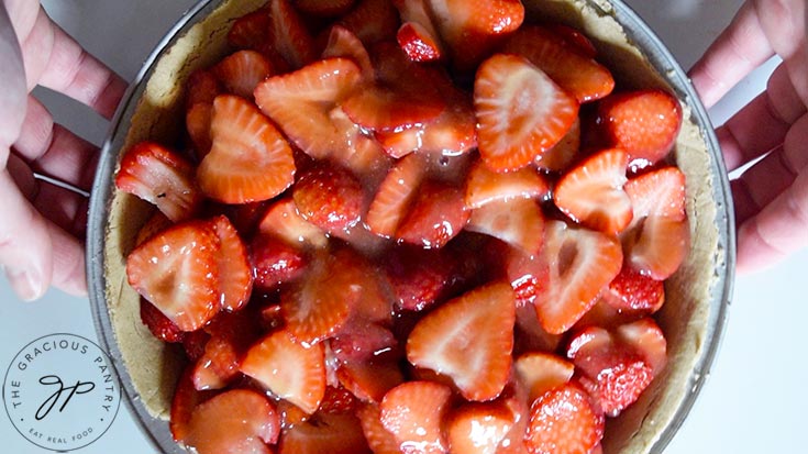 Fresh strawberry pie with glaze, ready to chill in the fridge.