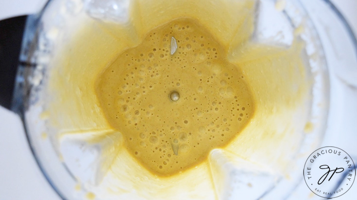The blended skillet pancake batter in a blender cup.