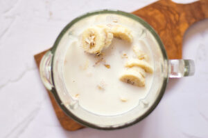 All the ingredients for this Blended Baked Oatmeal Recipe sitting in a blender tumbler.