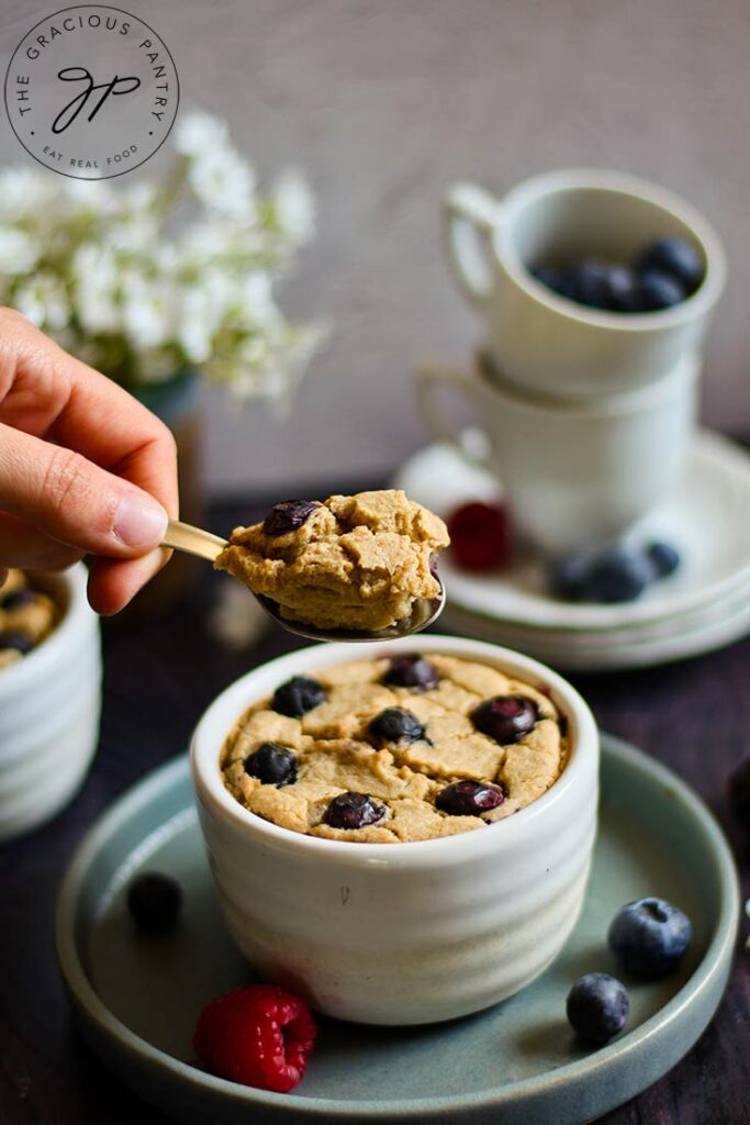 A spoon holds up a spoonful of this Blended Baked Oatmeal.