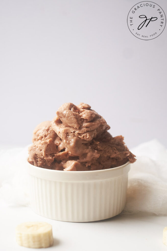 A white bowl filled with Chocolate Banana Nice Cream.