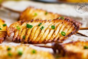 A close up of finished Accordion Potatoes cooked in an air fryer.