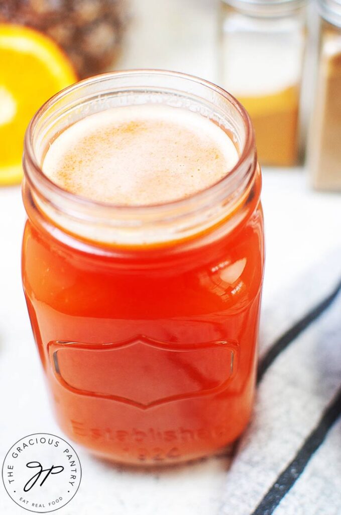 An up close view of a canning jar filled with Immunity Booster Shots.