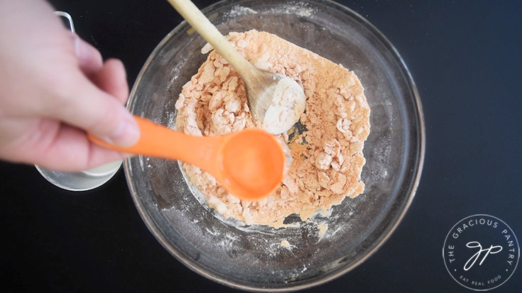 Adding 1 tablespoon of water to complete protein pasta dough.