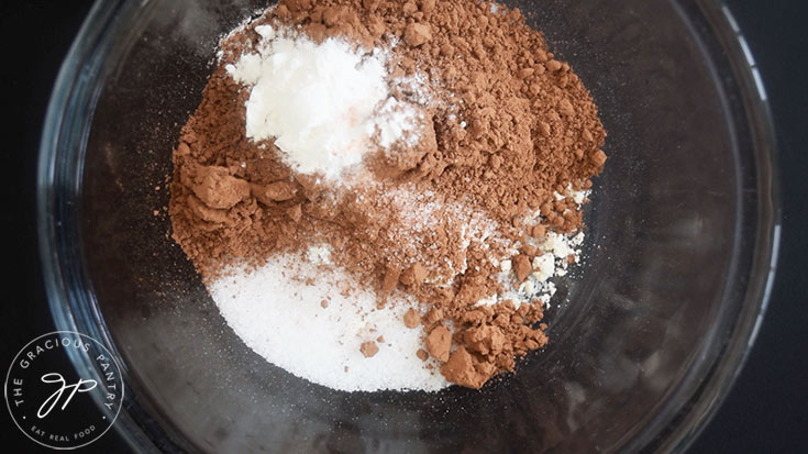 Cauldron Cake dry ingredients sitting in a mixing bowl.