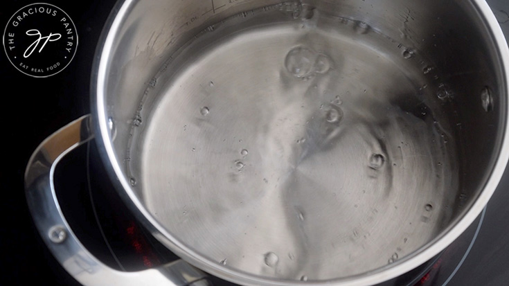 Water boiling in a pot.