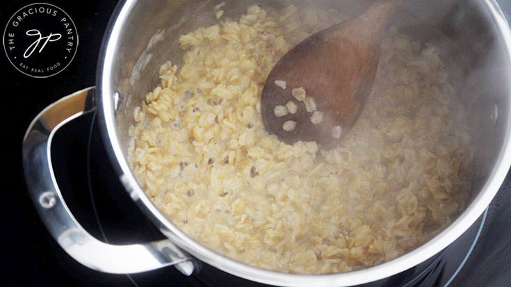 Cooked oatmeal in a pot.