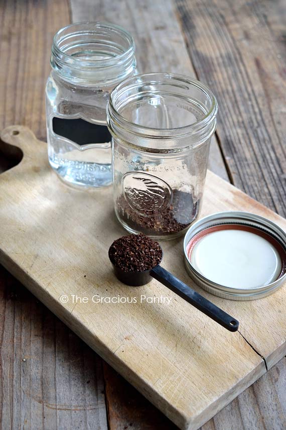 Cold brew coffee supplies sitting on a cutting board.