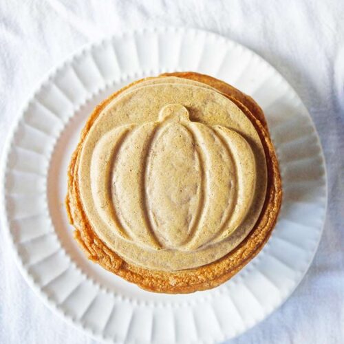 An overhead view looking down on a golden brown stack of Pumpkin Spice Pancakes.