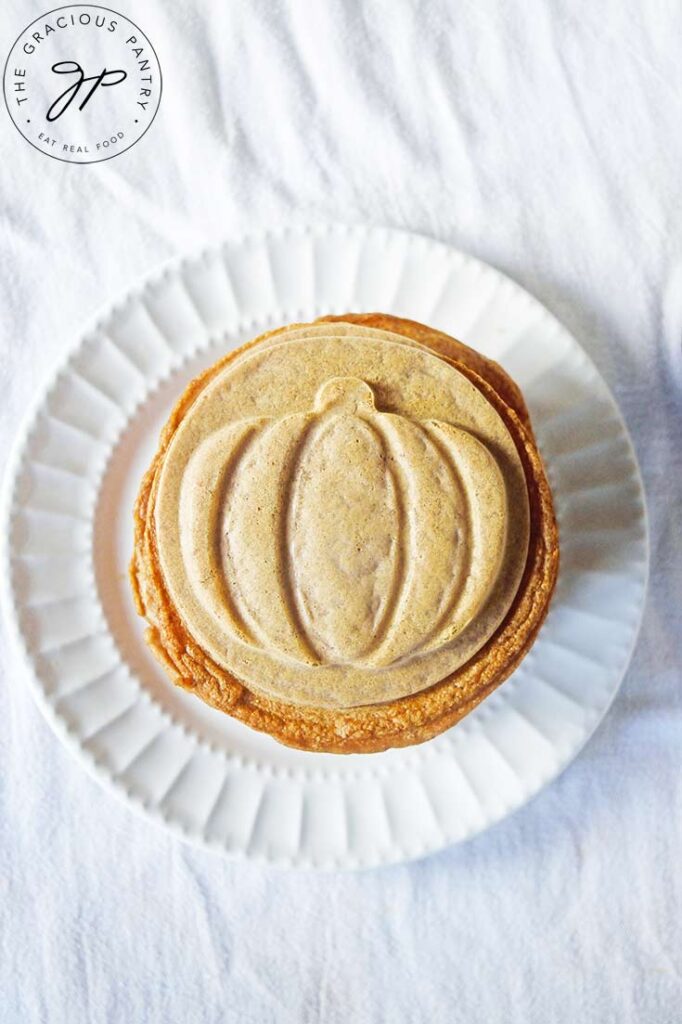 An overhead view looking down on a golden brown stack of Pumpkin Spice Pancakes.