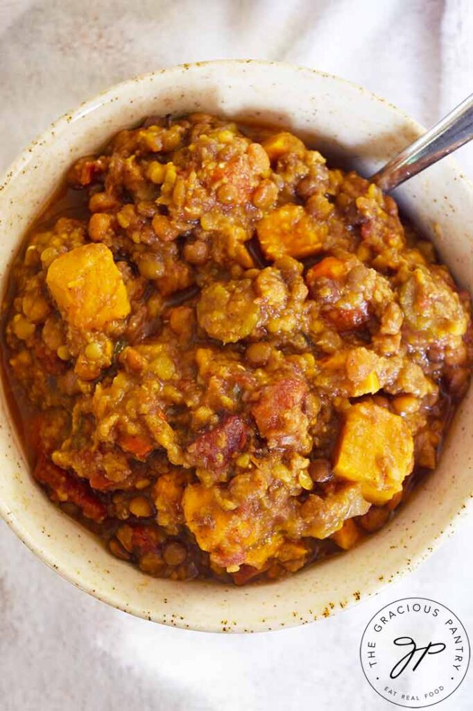 An overhead view of a bowl filled with Slow Cooker Lentil Stew.