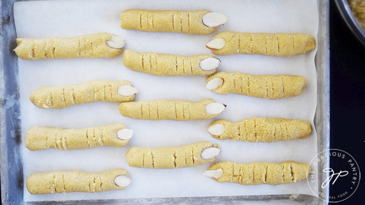 Shallow cuts cut into the Witch Finger Cookies to create knuckles.