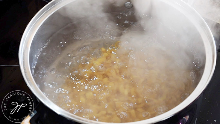 Pasta boiling in a large pot.