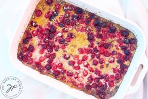 Just-baked Pumpkin Baked Oatmeal in a white casserole dish.