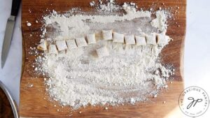 Just cut gnocchi on a floured cutting board.