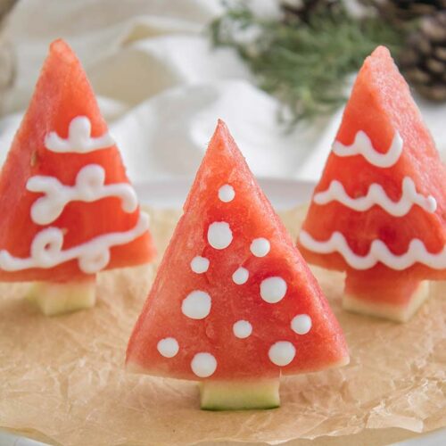 A close up of three Watermelon Christmas Trees.