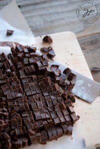 Chopped Mint Chocolate Chips on a cutting board.